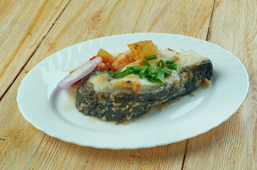 Boiled catfish, Romanian style.