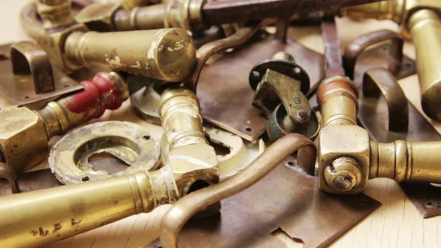 Bronze doorhandles and other vintage parts of doors