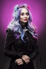 the gothic multi-colored hair girl on a violet background