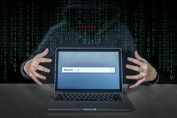 Hacker using adware fireball to control laptop computer using web browser search engine to spy and...