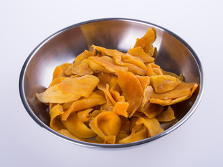 mango dry or dried mango slices on background.