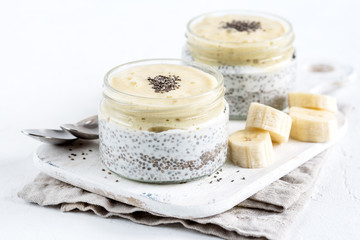 Chia seed pudding in glass jar. Superfoods concept with copy space. Healthy vegan food