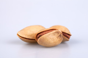 three almonds  on white background