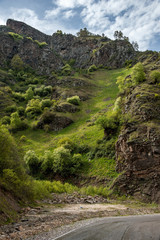 Fototapeta na wymiar Landscape asphalt road - serpentine in the Caucasus mountains