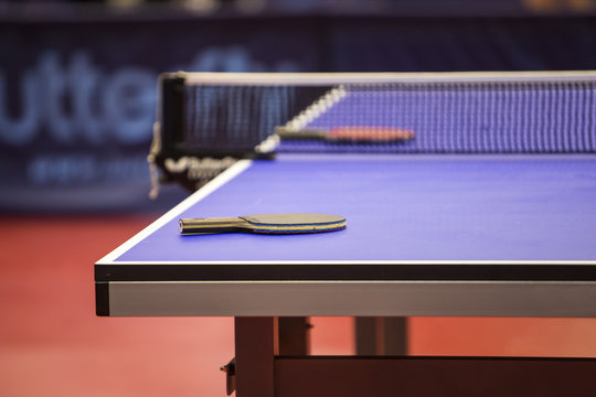 Table tennis table with racquet