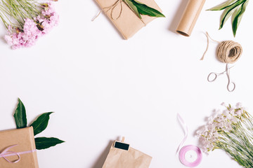 Festive floral arrangement on white background with frame for text
