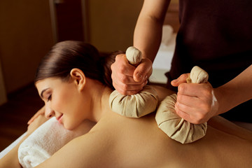 Close-up of a girl massage in  spa salon.