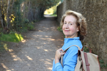 Natural outdoorsy 65 years old woman