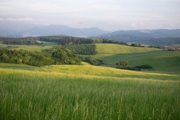 Sunrise and sunset over the hills and town. Slovakia