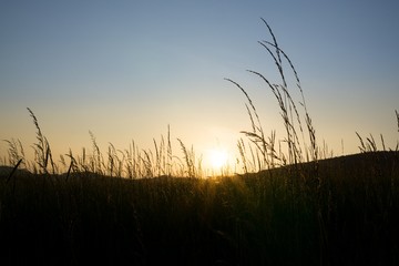 Fototapeta premium Sunrise and sunset over the hills and town. Slovakia