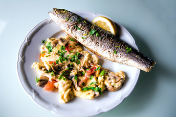 Baked fish mackerel with lemon