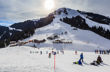 Skiers on the slopes of the ski resort of Soll, Tyrol, Austria