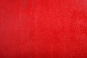 Natural red leather texture background.