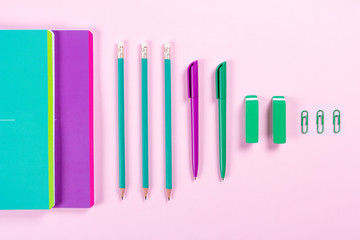 flat lay with various school supplies on colorful surface