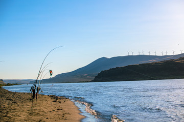 Bank fishing and kiteboarding