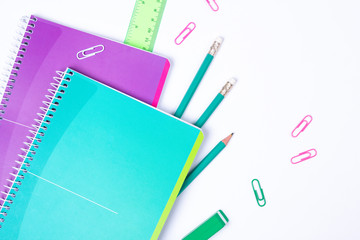 School stationery on white background with copyspace