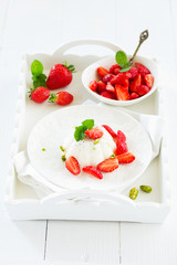 Creamy panna cotta with strawberries.