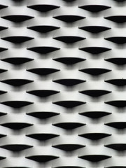metal grid material with semi circular perforations