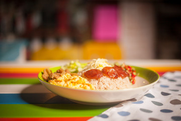 Rice Mixed with Shrimp paste on colorful table.