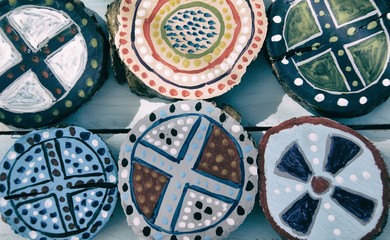 Decorative hand painted wood on blue background