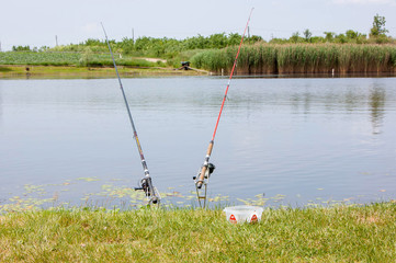 Obraz na płótnie Canvas Two fishing rods