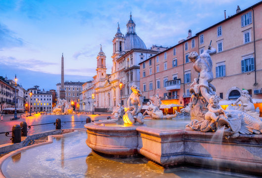 View of Piazza Navona and fountain before sunrise, Rome