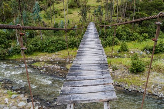 Fototapeta Suspension bridge over Toachi river near Quilotoa crater, Ecuador