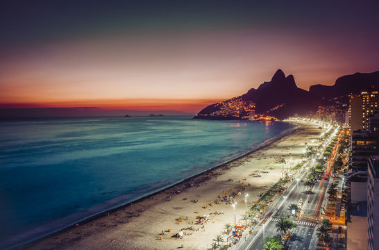 Sunset on Ipanema Beach and coastline street, Rio de Janeiro, Brazil
