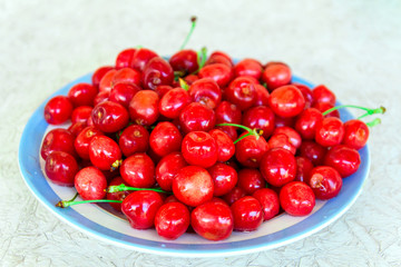 A plate of red cherries