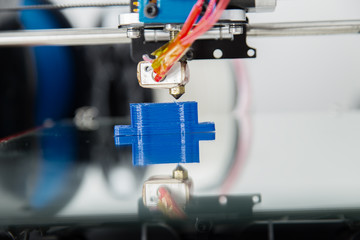 Electronic three dimensional plastic printer during work , 3D , printing.