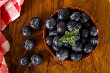 blueberries in the wooden plate 