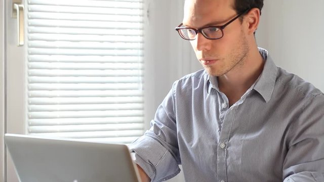 brainstorm or decision making, caucasian business man entrepreneur looking at computer in the office, startup