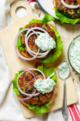 greek turkey burgers tzatziki sauce.selective focus