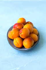 Apricots on plate