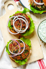 greek turkey burgers tzatziki sauce.selective focus