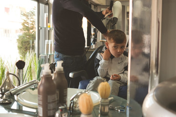 young children at barber shop 