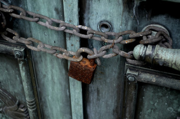 Rusty Lock on Old Copper Door 