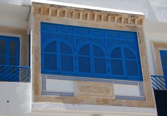 White and blue balcony Sidi Bou Said/ Blue and white shutters and a window in the town of Sidi Bou Said, Tunisia