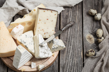 Fototapeta na wymiar arrangement of gourmet cheeses