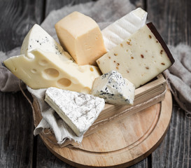 arrangement of gourmet cheeses
