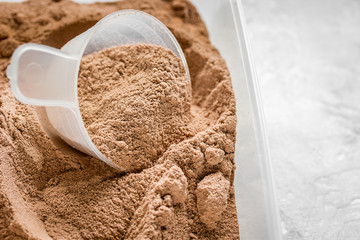 Sport and diet nutrition with equipment on stone background top view