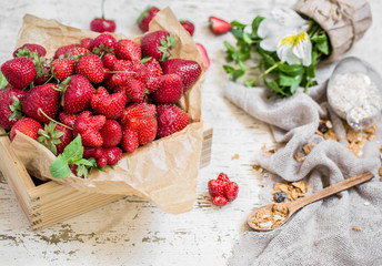 Fresh strawberries in a wooden box