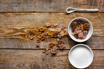 cooking sweets set with different sugar lumps on rustic table background top view mockup