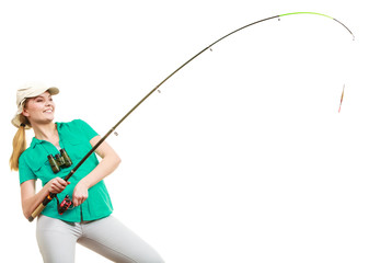 Woman with fishing rod, spinning equipment