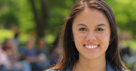 Young Asian woman in city face portrait