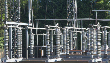 Fragment of Electrical Substation on the background of green trees
