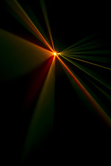 Laser beam tilt orange on a black background
