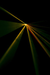 Laser beam tilt orange on a black background