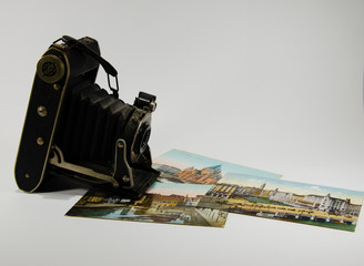 antiqu camera with old photos