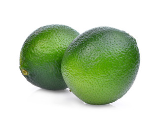 two fresh green lime isolated on white background